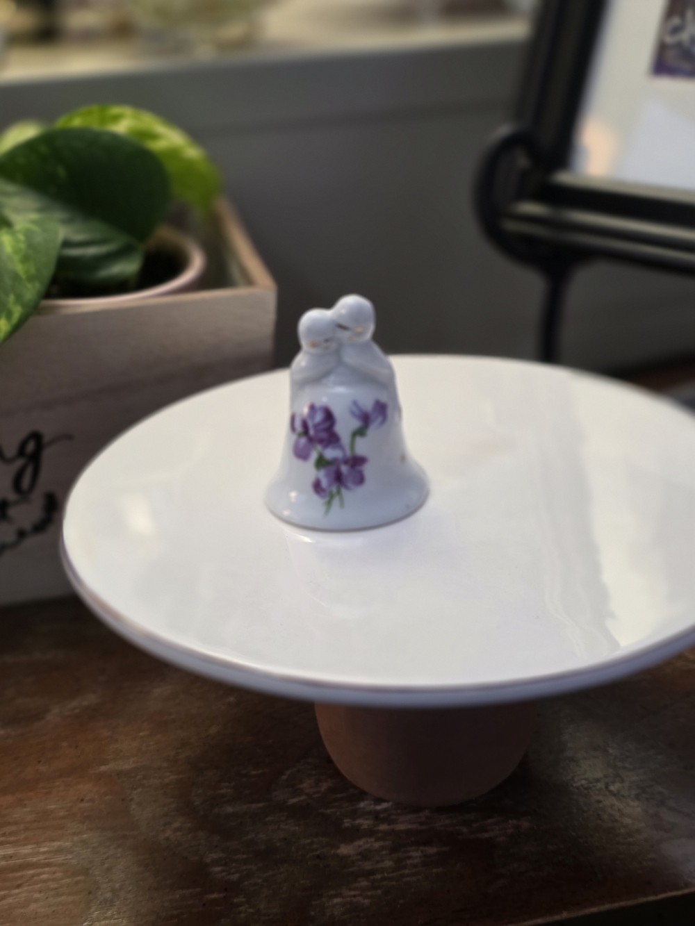White Ceramic Bell Figurine with Purple Floral Detail - Decorative Accent